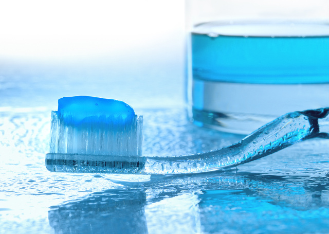 toothbrush fluoride toothpaste mouthwash glass water